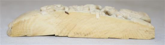 A Chinese ivory figural brush rest, 18th century, length 9.7cm